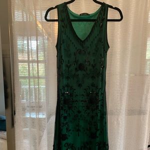 emerald green dress with black sequence